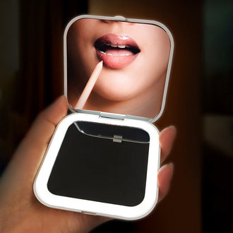 Compacte vergrotende make-upspiegel met LED