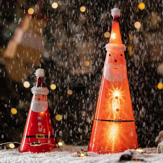 Accendi la lampada in vetro di Babbo Natale